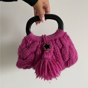 Small handmade knitted purse